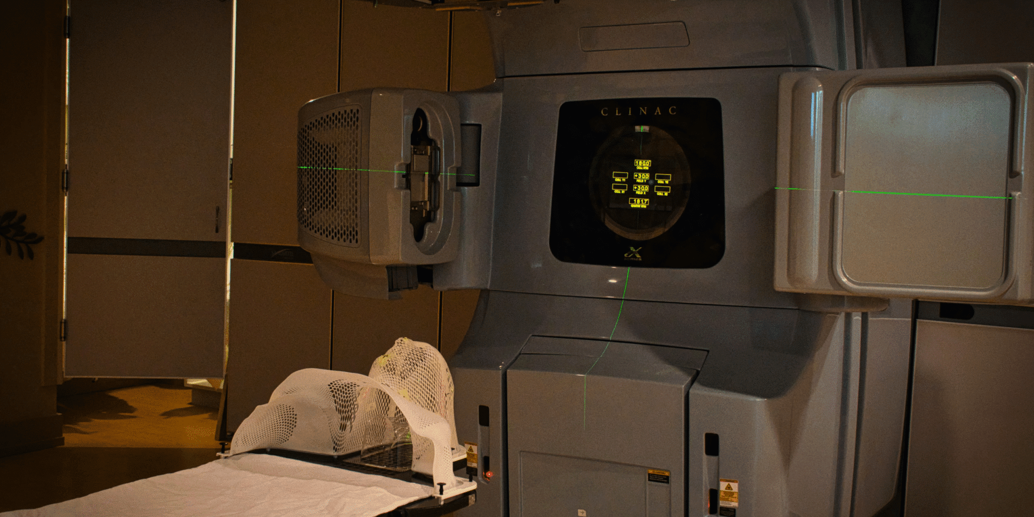 A modern hospital room featuring advanced medical equipment subtly powered by AI.